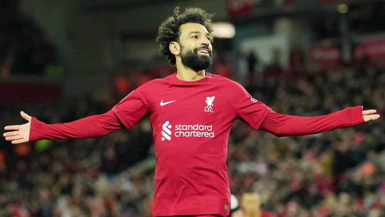 Liverpool&#39;s Mohamed Salah celebrates scoring his side&#39;s second goal during the English FA Cup soccer match between Liverpool and Wolverhampton Wanderers at Anfield in Liverpool, England Saturday, Jan. 7, 2023 (AP Photo/Jon Super)