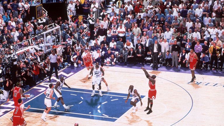 Chicago Bulls' Michael Jordan makes the winning shot during Game 6 of the NBA Finals against the Utah Jazz at the Delta Center in Salt Lake City, Utah