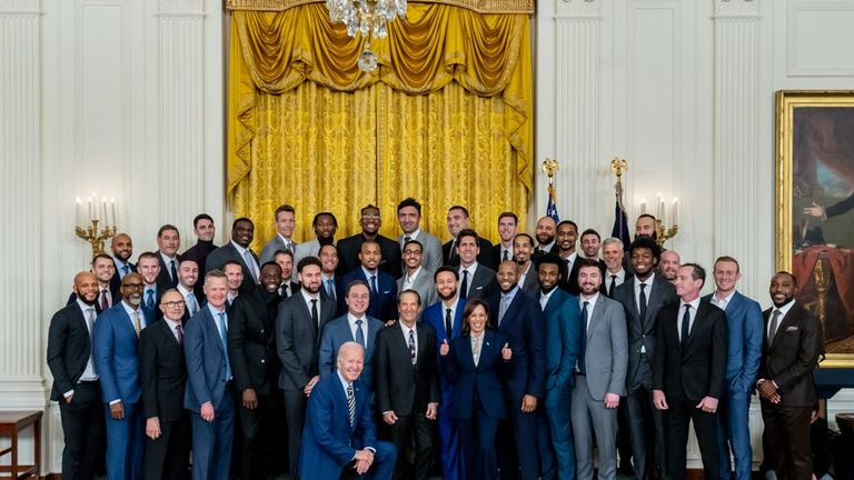 The Golden State Warriors take a group picture with president Joe Biden, vice-president Kamala Harris, and the White House staff. 