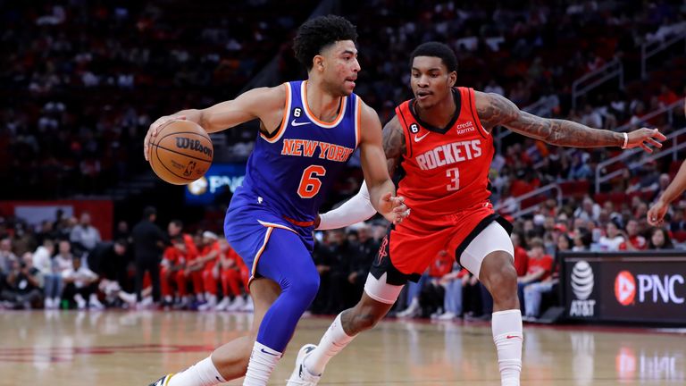 New York Knicks guard Quentin Grimes (6) drives around Houston Rockets guard Kevin Porter Jr. (3) during the first half of an NBA basketball game Saturday, Dec. 31, 2022, in Houston. (AP Photo/Michael Wyke)


