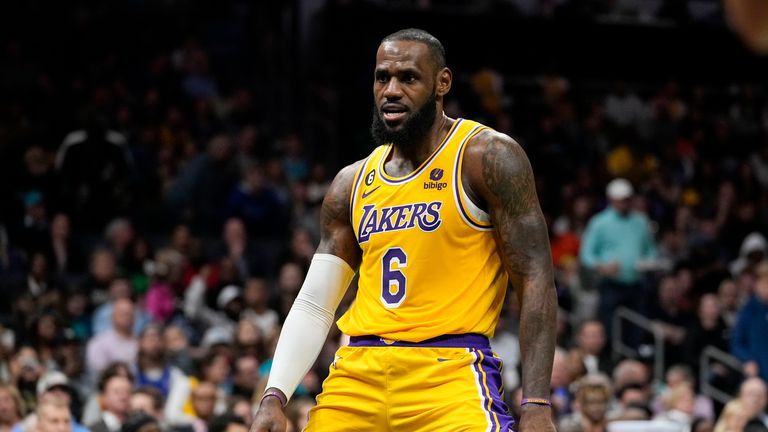 Los Angeles Lakers forward LeBron James celebrates after scoring during the first half of an NBA basketball game between the Charlotte Hornets and the Los Angeles Lakers on Monday, Jan. 2, 2023, in Charlotte, N.C.