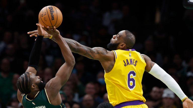 Boston Celtics&#39; Jaylen Brown (7) shoots against Los Angeles Lakers&#39; LeBron James (6).