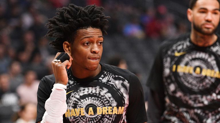 Sacramento Kings Guard De'Aaron Fox (5), wearing a special t-shirt for Martin Luther King Day, looks on before an NBA game between the Sacramento Kings and the Los Angeles Clippers