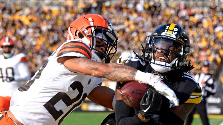 Cleveland Browns cornerback Greg Newsome II (20) breaks up a pass intended for Pittsburgh Steelers wide receiver Diontae Johnson (18) in the endzone during the first half of an NFL football game in Pittsburgh, Sunday, Jan. 8, 2023.