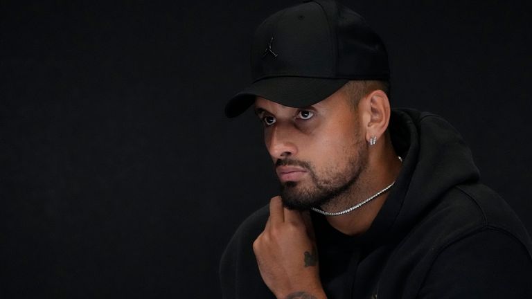 Australia&#39;s Nick Kyrgios reacts as he announces his withdrawal from the Australian Open with a knee injury at a press conference in Melbourne, Australia, Monday, Jan. 16, 2023. (AP Photo/Mark Baker)