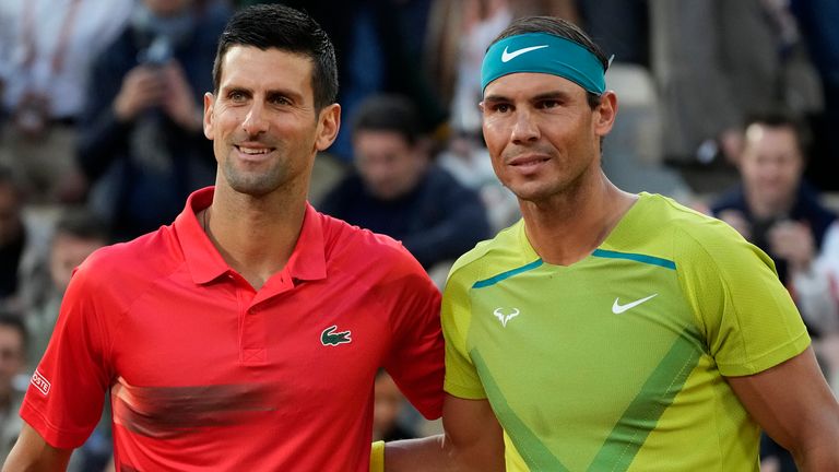 Serbia's Novak Djokovic, left, and Spain's Rafael Nadal pose ahead of their quarterfinal match at the French Open tennis tournament in Paris, France, Tuesday, May 31, 2022. The Australian Open tennis tournament begins Monday, Jan. 16, 2023. Nadal is the defending champion and who owns a men...s-record 22 majors. It is Djokovic, though, who will draw the most attention. (AP Photo/Christophe Ena, File)