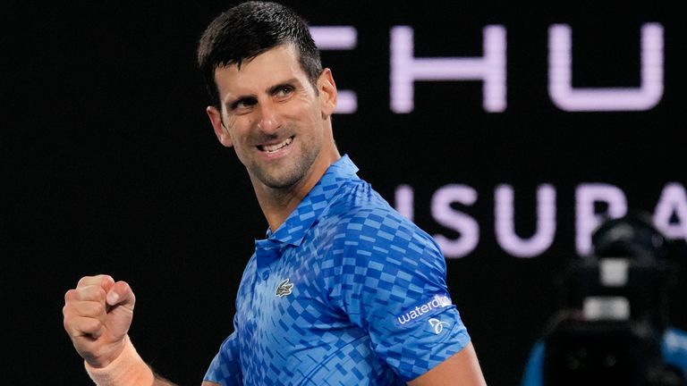 Novak Djokovic of Serbia reacts after winning a point against Roberto Carballes Baena of Spain during their first round match at the Australian Open tennis championship in Melbourne, Australia, Tuesday, Jan. 17, 2023. (AP Photo/Aaron Favila)