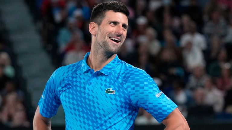 Novak Djokovic of Serbia reacts during his second round match against Enzo Couacaud of France at the Australian Open tennis championship in Melbourne, Australia, Thursday, Jan. 19, 2023. (AP Photo/Dita Alangkara)