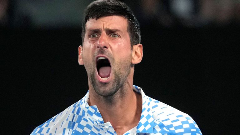 Novak Djokovic of Serbia reacts during his quarterfinal against Andrey Rublev of Russia at the Australian Open tennis championship in Melbourne, Australia, Wednesday, Jan. 25, 2023. (AP Photo/Dita Alangkara) 