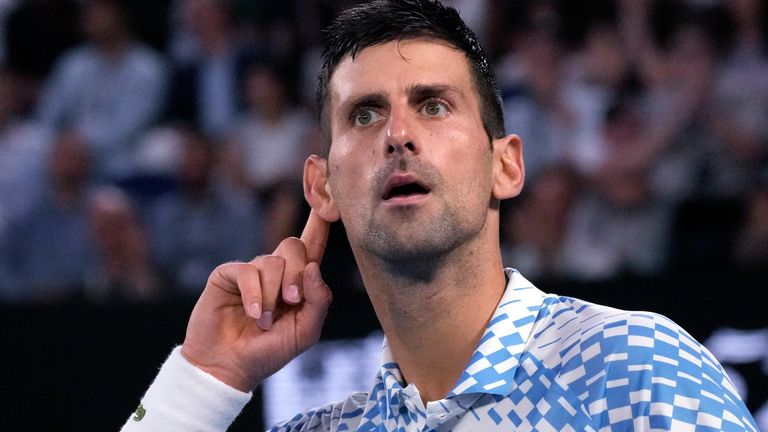 Novak Djokovic of Serbia reacts after winning the first set against Tommy Paul of the U.S. during their semifinal at the Australian Open tennis championship in Melbourne, Australia, Friday, Jan. 27, 2023. (AP Photo/Aaron Favila)