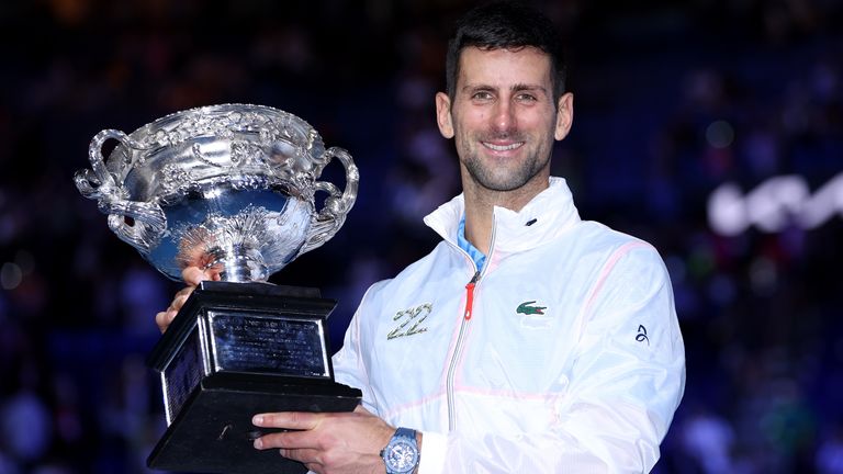 Novak Djokovic of Serbia poses with the Norman Brookes Challenge Cup after winning the men's singles final match against Stefanos Tsitsipas of Greece on day 14 of the Australian Open 2023 at Melbourne Park on January 29, 2023 in Melbourne, Australia.  (Photo by Clive Brunskill/Getty Images)