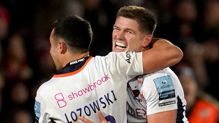 Saracens' Owen Farrell celebrates with team mate Alex Lozowski 