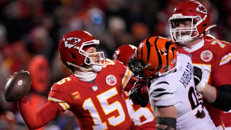 Kansas City Chiefs quarterback Patrick Mahomes (15) passes under pressure from the Cincinnati Bengals during the second half of the NFL AFC Championship playoff football game, Sunday, Jan. 29, 2023, in Kansas City, Mo. 