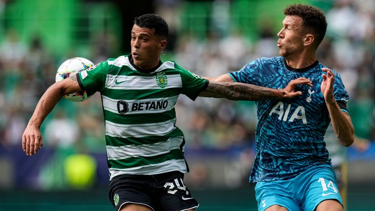 Sporting's Pedro Porro, left, and Tottenham's Ivan Perisic challenge for the ball during a Champions League group D soccer match between Sporting CP and Tottenham Hotspur at the Alvalade stadium in Lisbon, Tuesday, Sept. 13, 2022. (AP Photo/Armando Franca)