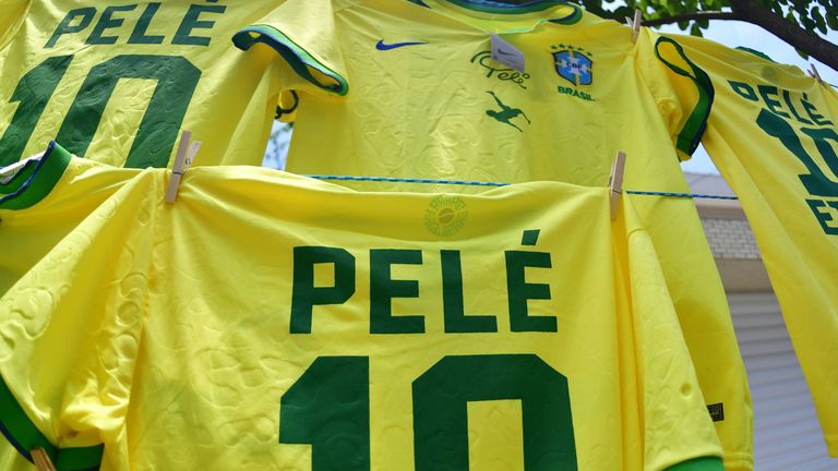 Pele shirts on sale during his funeral at Vila Belmiro Stadium