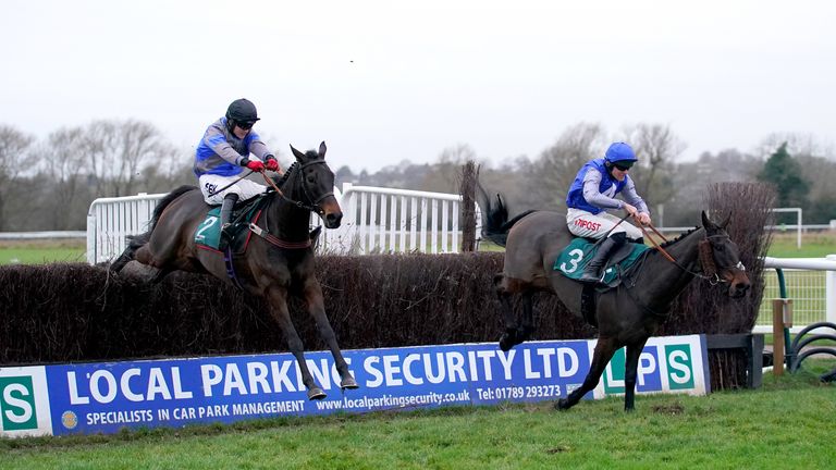 Pemberley (left), ridden by jockey Thomas Bellamy, clears a jump on the way to winning at Warwick