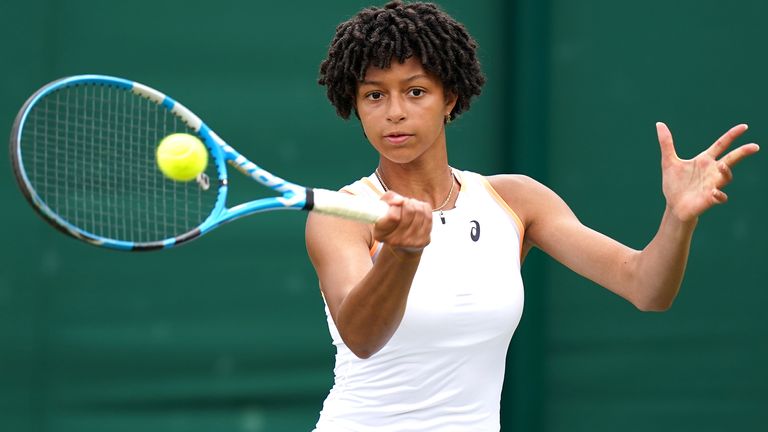 Ranah Stoiber in action against Madison Sieg in the girl's first round match on court 4 on day seven of Wimbledon at The All England Lawn Tennis and Croquet Club, Wimbledon. Picture date: Monday July 5, 2021.