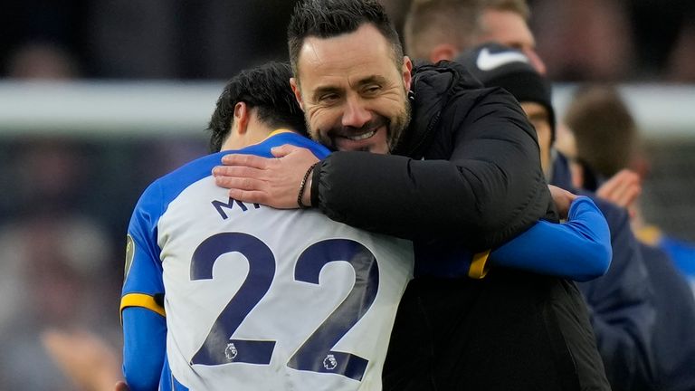 Roberto De Zerbi embraces match-winner Kaoru Mitoma at full-time