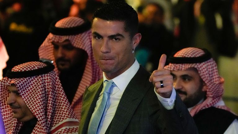 Cristiano Ronaldoreacts during his official unveiling as a new member of Al Nassr soccer club in in Riyadh, Saudi Arabia, Tuesday, Jan. 3, 2023.Ronaldo, who has won five Ballon d'Ors awards for the best soccer player in the world and five Champions League titles, will play outside of Europe for the first time in his storied career. (AP Photo/Amr Nabil)