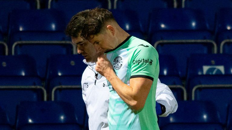 DINGWALL, SCOTLAND - JANUARY 31: Hibs' Kevin Nisbet is dejected as he goes off with an injury during a cinch Premiership match between Ross County and Hibernian at the Global Energy Stadium, on January 31, 2023, in Dingwall, Scotland. (Photo by Paul Devlin / SNS Group)
