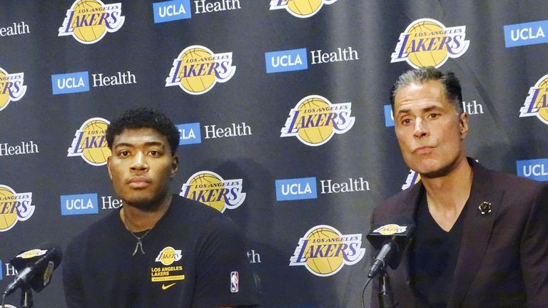 Rui Hachimura (L) is introduced by the Los Angeles Lakers in a press conference in Los Angeles, California, on Jan. 24, 2023.