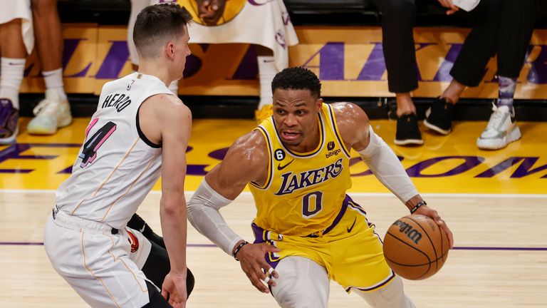 Los Angeles Lakers guard Russell Westbrook (0) drives against Miami Heat guard Tyler Herro.