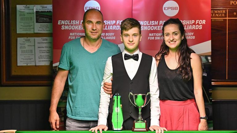 Vladislav Gradinari with his mum and dad as the teenager lifted the English Partnership for Snooker and Billiards under-14 title