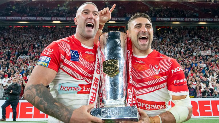 Picture by Allan McKenzie/SWpix.com - 24/09/2022 - Rugby League - Betfred Super League Grand Final - St Helens v Leeds Rhinos - Old Trafford, Manchester, England - Curtis Sironen & Tommy Makinson with the Betfred Super League trophy.