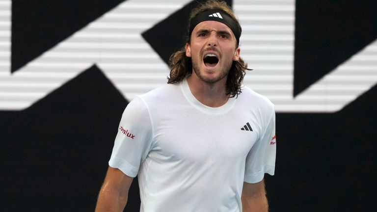 Stefanos Tsitsipas of Greece reacts as he plays against Jannik Sinner of Italy during their fourth round match at the Australian Open tennis championship in Melbourne, Australia, Sunday, Jan. 22, 2023. (AP Photo/Mark Baker)