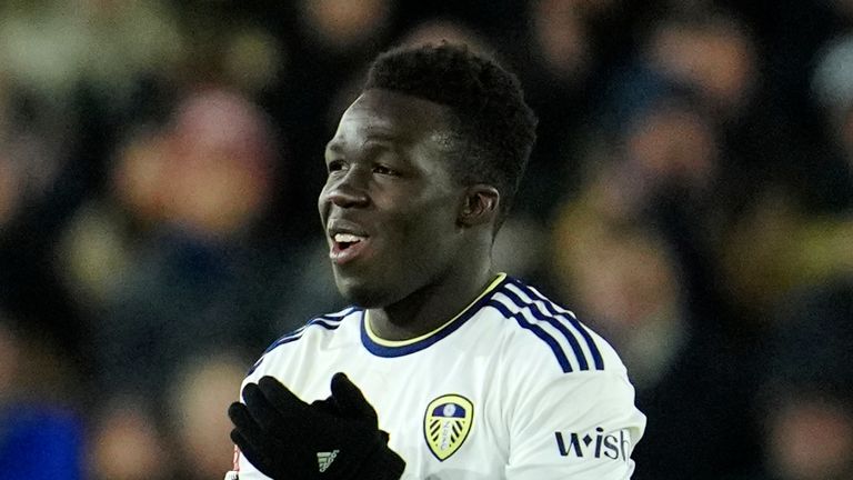 Leeds United's Wilfried Gnonto applauds to supporters and leaves the pitch after being substituted during the English FA Cup third round soccer match between Leeds United and Cardiff City at Elland Road Stadium in Leeds, England, Wednesday, Jan. 18, 2023. (AP Photo/Jon Super)