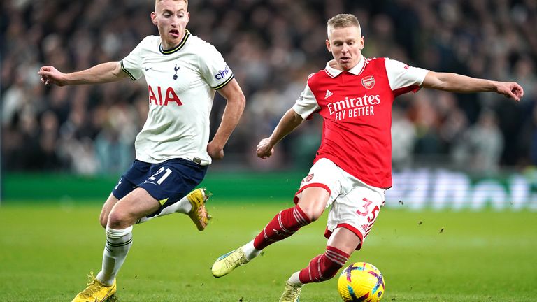 Oleksandr Zinchenko dribbles past Dejan Kulusevski against Tottenham