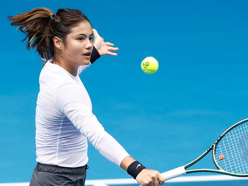 Emma Raducanu pictured in Tottenham jersey during tennis practice