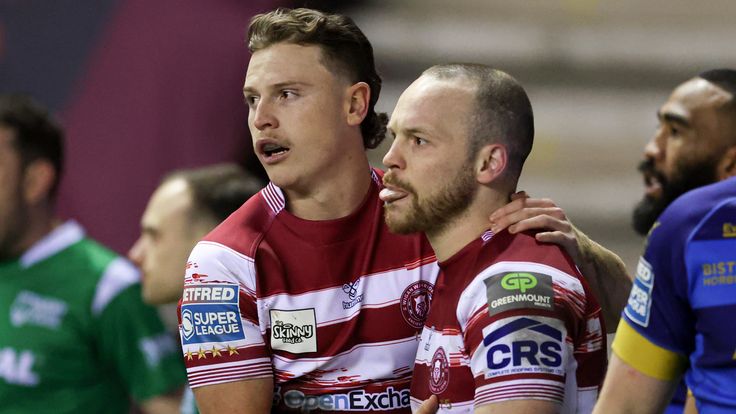 Picture by Paul Currie/SWpix.com - 24/02/2023 - Rugby League - Betfred Super League Round 2 - Wigan Warriors v Wakefield Trinity - DW Stadium, Wigan, England - Liam Marshall of Wigan Warrior celebrates scoring his hat trick try