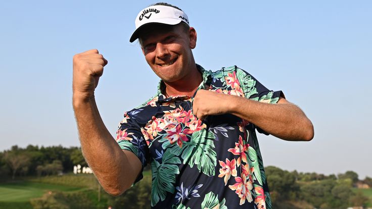 Marcel Siem of Germany celebrates after winning the Hero Indian Open