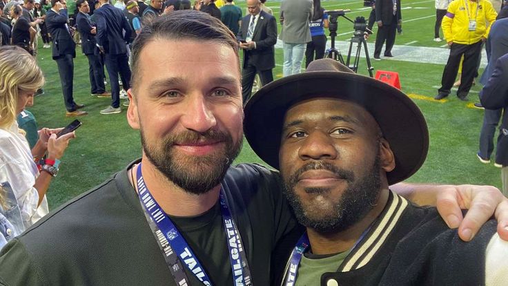 Yurii Hundych (president of ULAF and current soldier) pictured with Kyiv Patriots head coach Alfie Williams on the sidelines of the Super Bowl