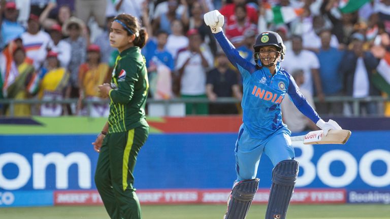India&#39;s Jemimah Rodrigues, right, celebrates her 50 and the winning runs against Pakistan, during the Women&#39;s T20 World Cup cricket match in Cape Town, South Africa, Sunday Feb. 12, 2023. (AP Photo/Halden Krog)