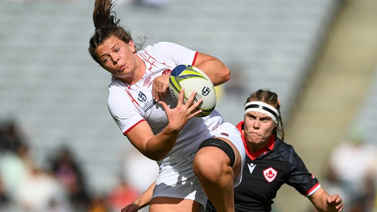 Abbie Ward of England leaps to take the ball during the women's rugby World Cup semifinal between Canada and England at Eden Park in Auckland, New Zealand, Saturday, Nov.5, 2022. (Andrew Cornaga/Photosport via AP)