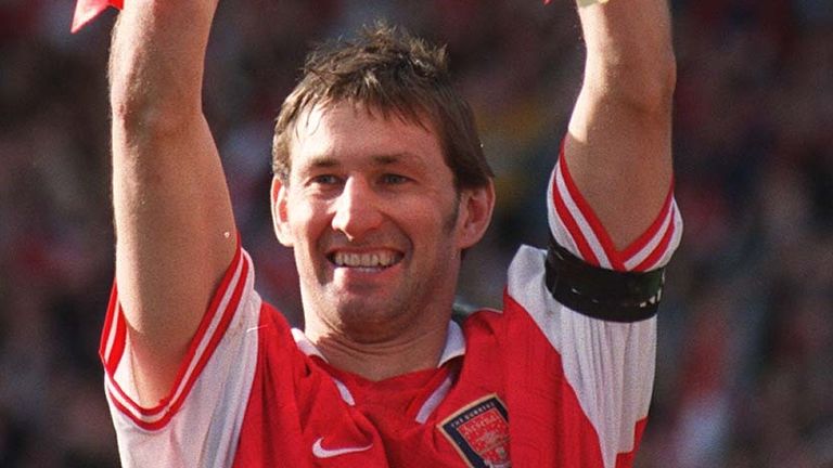 Tony Adams lifts the 1998 Premier League tile with Arsenal