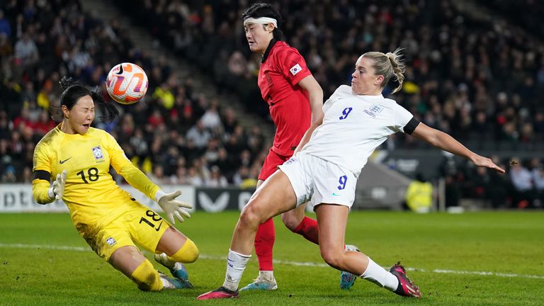 Alessia Russo scores a cheeky chip to add to England's lead