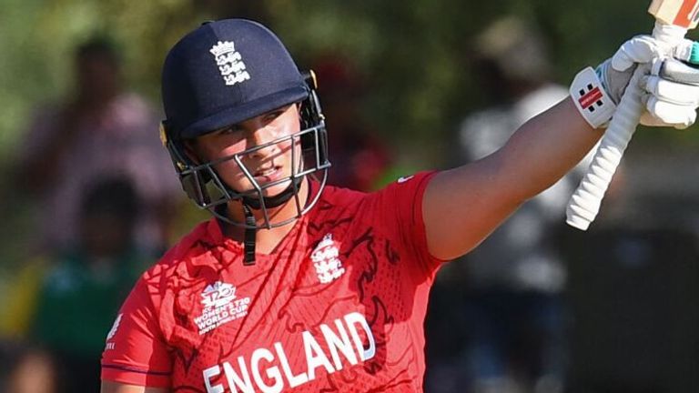 England's Alice Capsey raises her bat after scoring fifty against Ireland at Women's T20 World Cup (Getty Images)