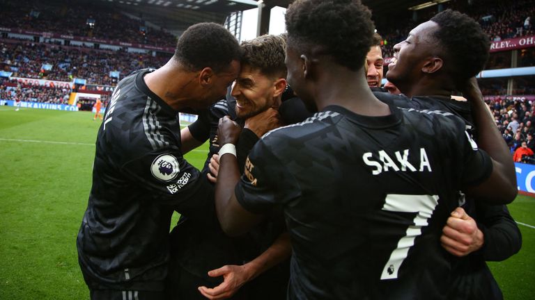 Jorginho celebrates with team-mates after Arsenal scored their third in the 4-2 win