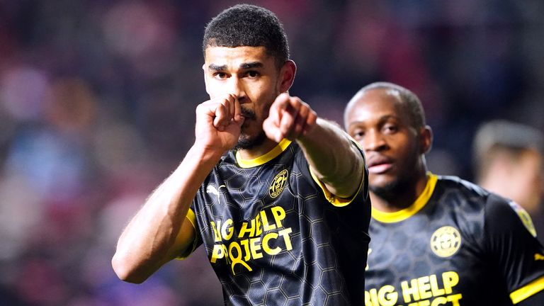 Ashley Fletcher celebrates scoring Wigan's equaliser