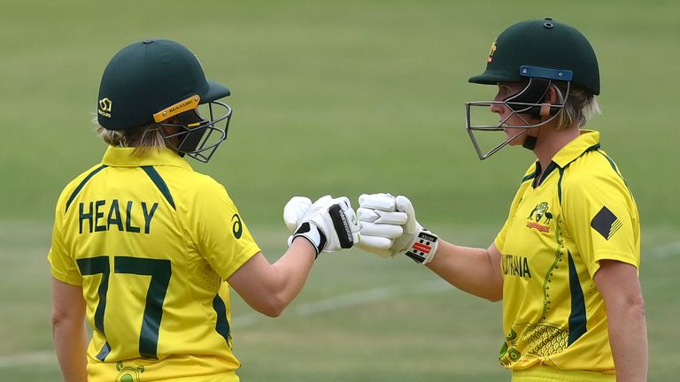 GQEBERHA, SOUTH AFRICA - FEBRUARY 16: Beth Mooney of Australia interacts with team mate Alyssa Healy during the ICC Women's T20 World Cup group A match between Sri Lanka and Australia at St George's Park on February 16, 2023 in Gqeberha, South Africa. (Photo by Mike Hewitt/Getty Images)
