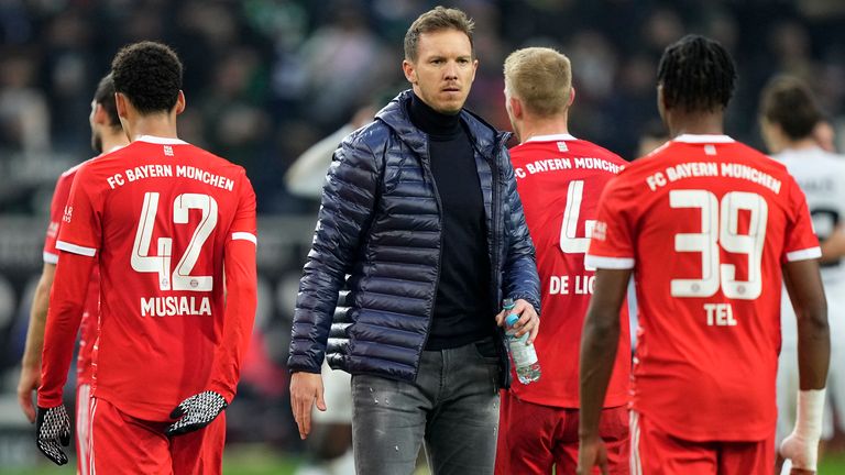 Bayern's head coach Julian Nagelsmann, center reacts at the end of the German Bundesliga soccer match between Borussia Moenchengladbach and Bayern Munich at the Borussia Park in Moenchengladbach, Germany, Saturday, Feb. 18, 2023. (AP Photo/Martin Meissner)