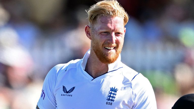 England&#39;s Ben Stokes, left, checks on New Zealand&#39;s Michael Bracewell after her was struck on the helmet by a ball on the second day of their cricket test match in Tauranga, New Zealand, Friday, Feb. 17, 2023. (Andrew Cornaga/Photosport via AP)