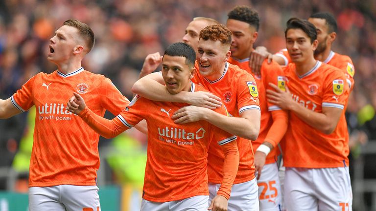 Ian Poveda is mobbed after giving Blackpool the lead against Stoke