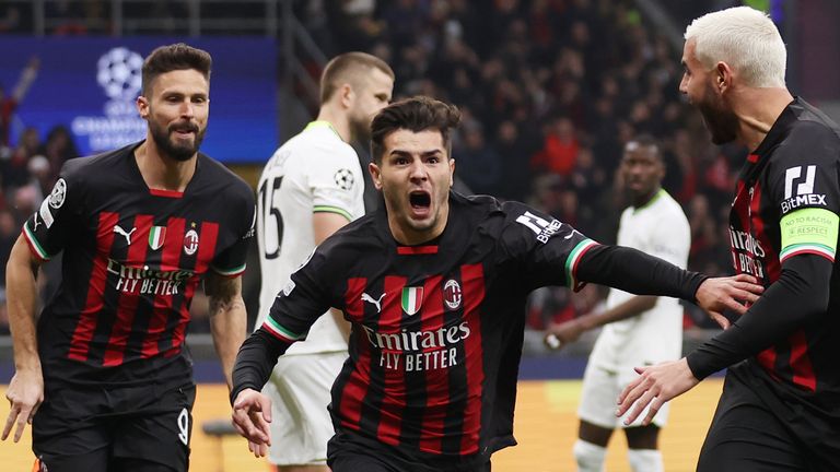 Brahim Diaz of AC Milan celebrates with team-mate Theo Hernandez (R) after scoring vs Spurs