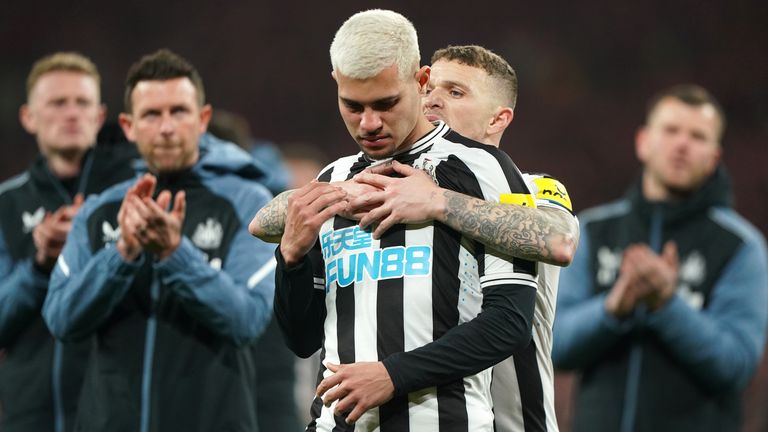 Bruno Guimaraes is consoled by Kieran Trippier after the cup final defeat