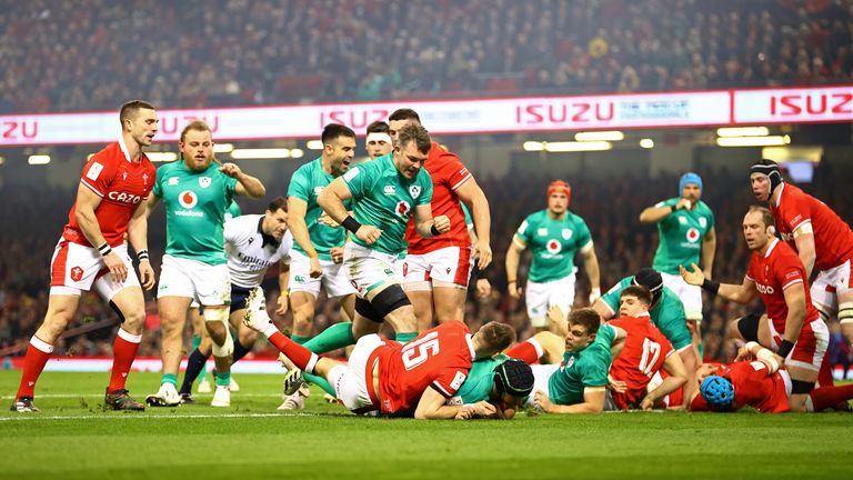Caelan Doris (centre) touches down for Ireland against Wales
