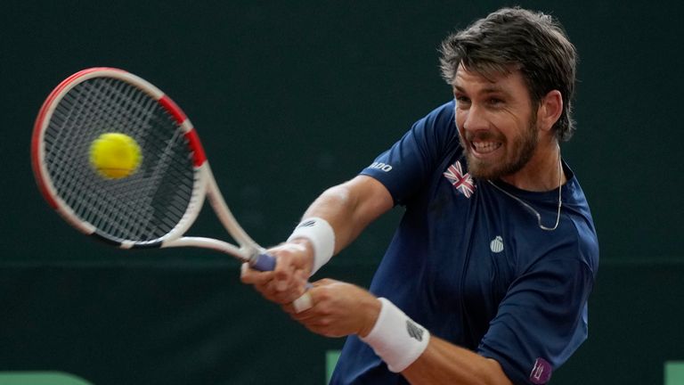 Cameron Norrie, of Britain, returns the ball to Nicolas Mejia of Colombia during their Davis Cup qualifiers tennis match in Cota, Colombia, Saturday, Feb. 4, 2023. (AP Photo/Fernando Vergara)